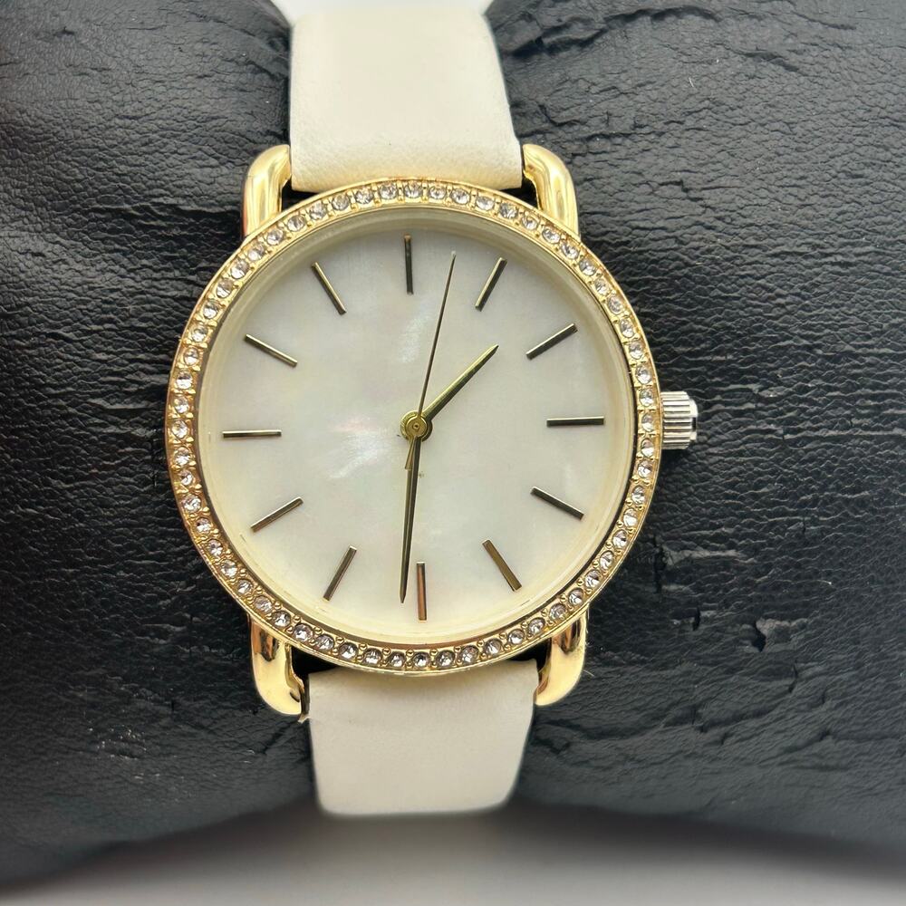 Women’s Gold-tone Crystal Bezel Mother Pearl Dial White Band Minimalist Watch